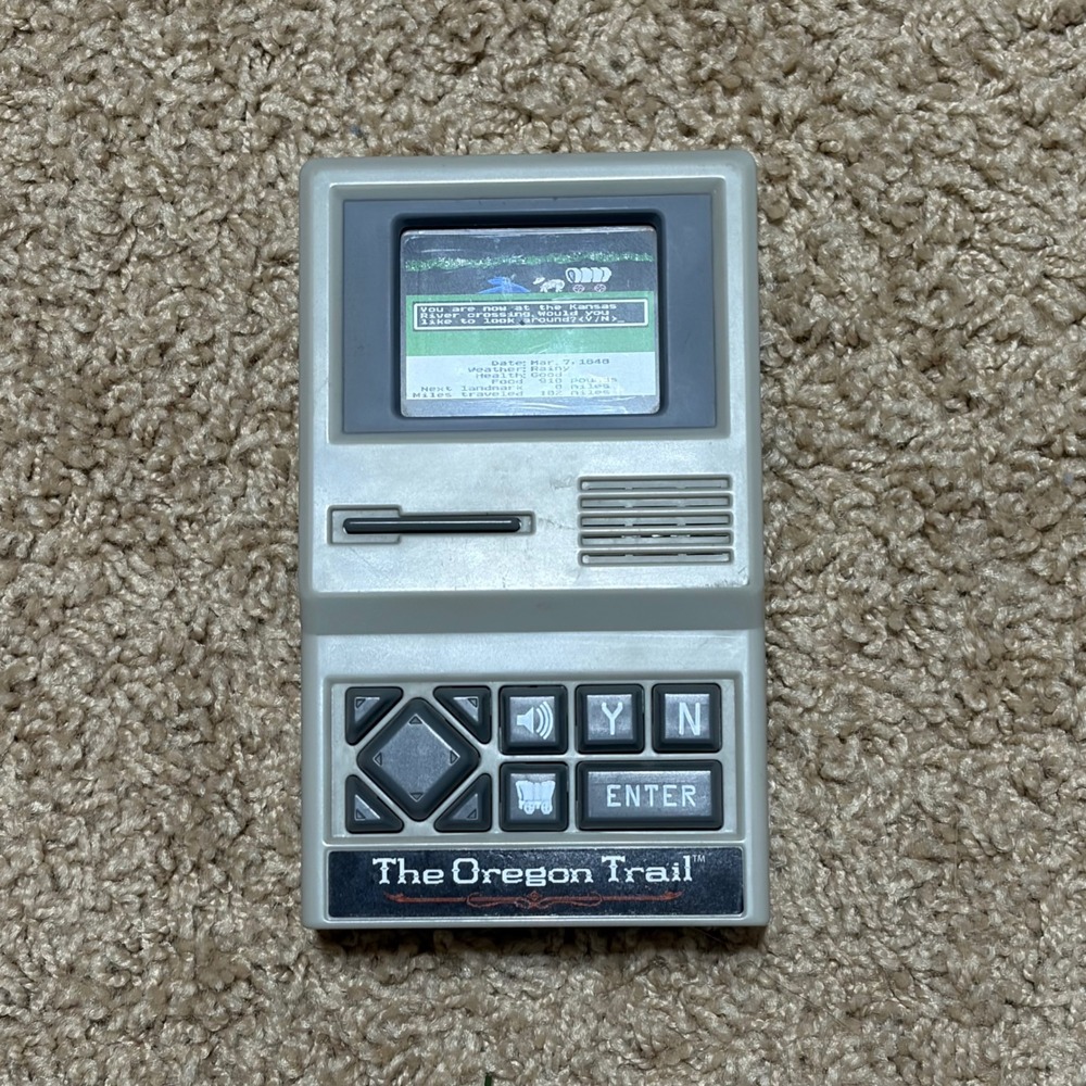 Basic Fun The Oregon Trail Handheld Electronic Game Retro Classic 09597 2017